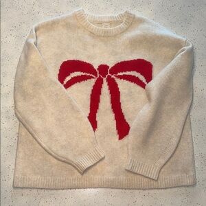a new day Cream Sweater with Red Bow
